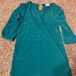 Women’s knee length, greenish blue dress